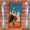 cartel y chapa decorativa retro vintage con una parejea bailando tango